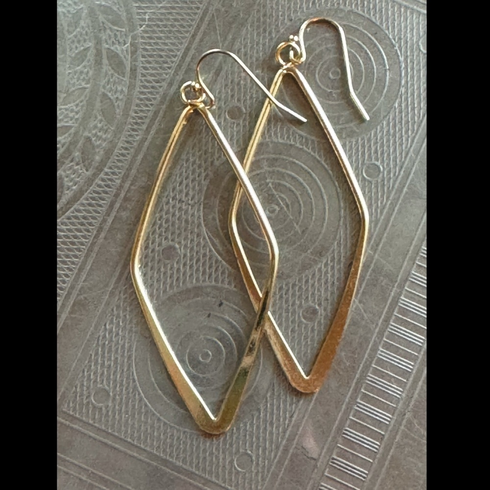 Gold-colored big diamond-shaped hoops